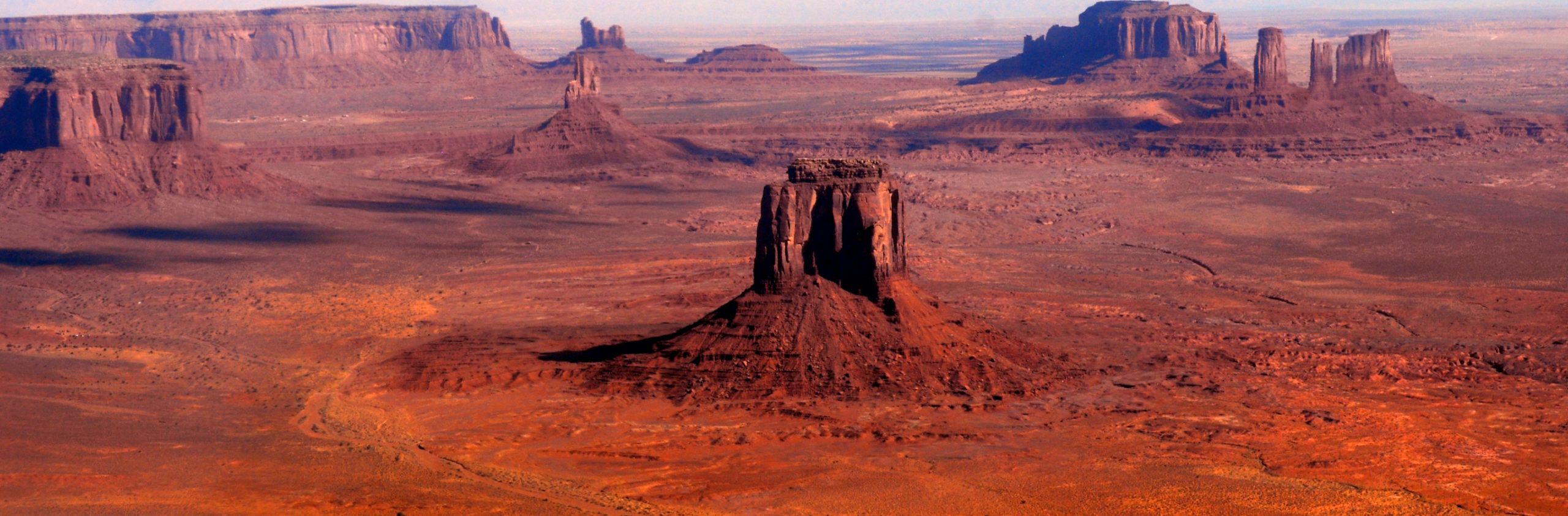 Sweeping view of Monument Valley from the sky