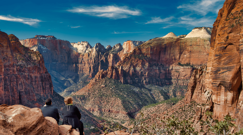 Couple taking in views of Zion National Park during Mighty 5 trip