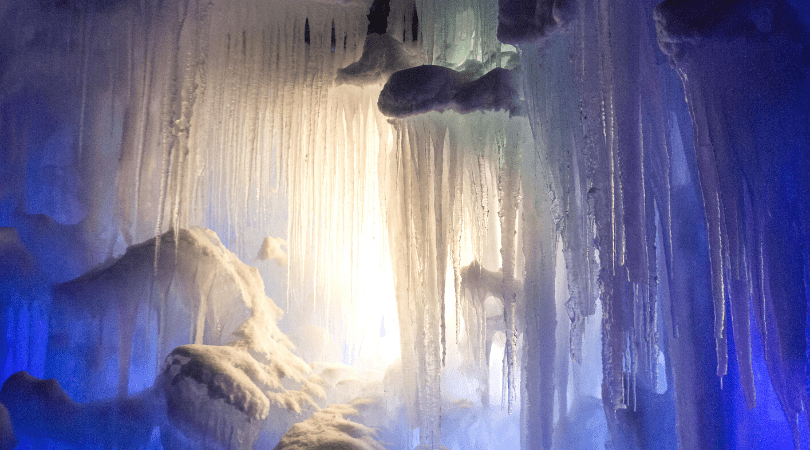 light glowing behind ice castle formations