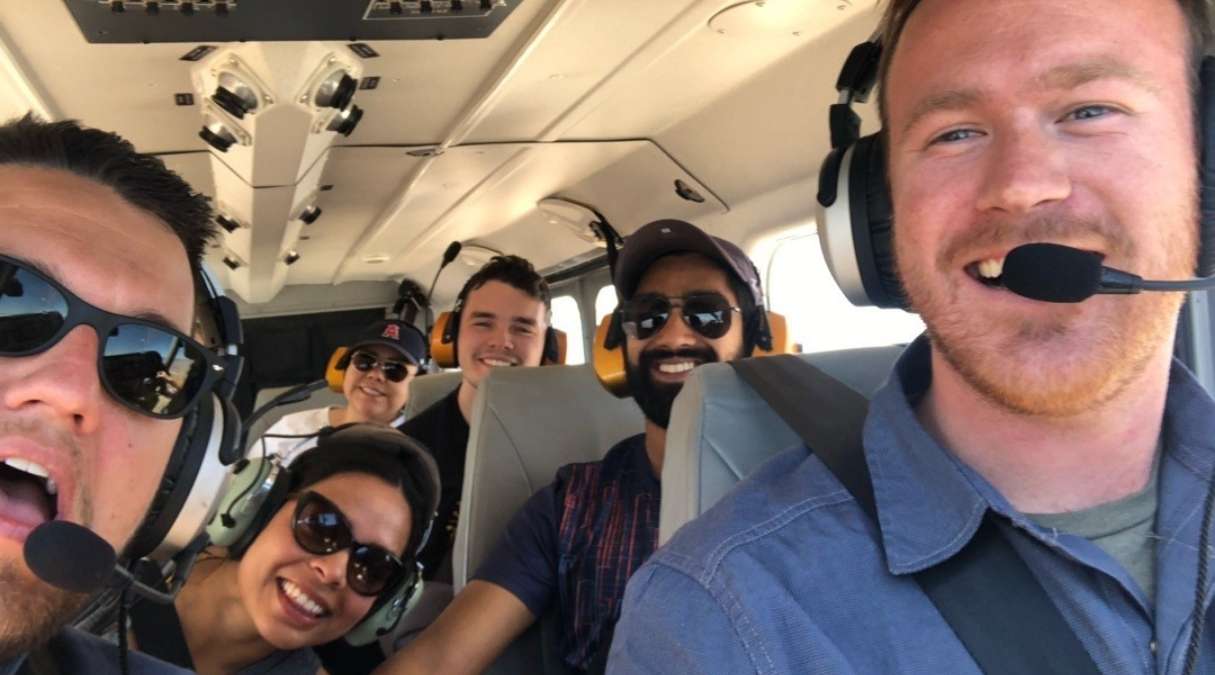 guests smiling on a scenic air tour