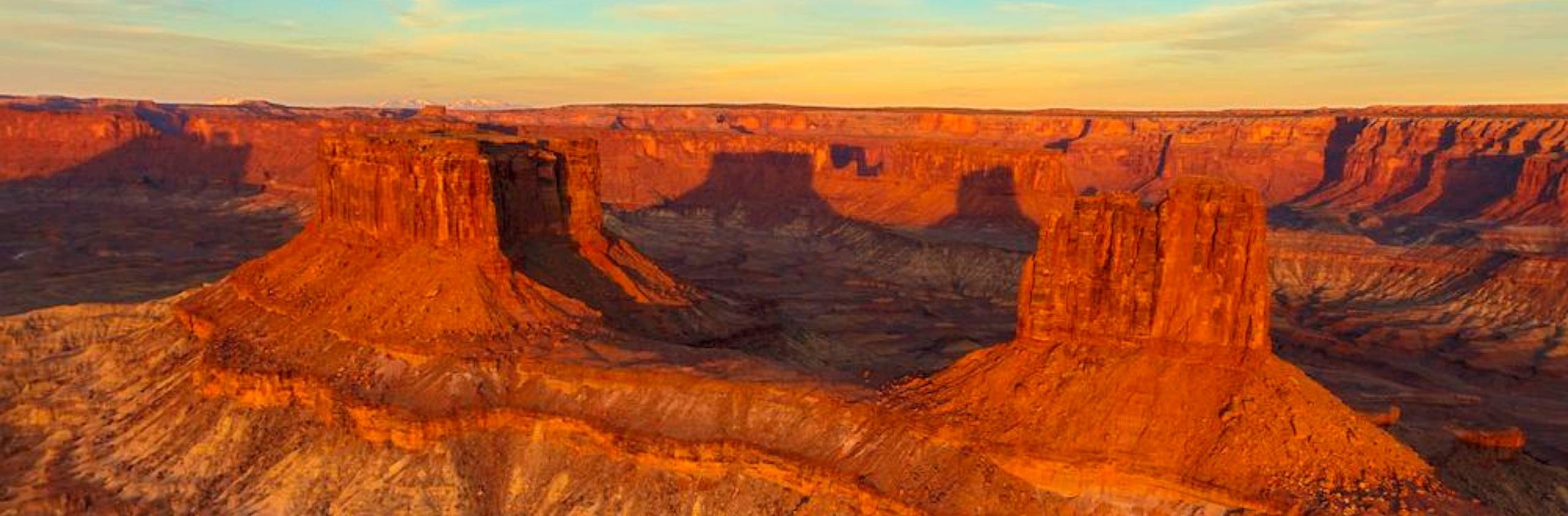canyonlands glowing red and orange at sunset