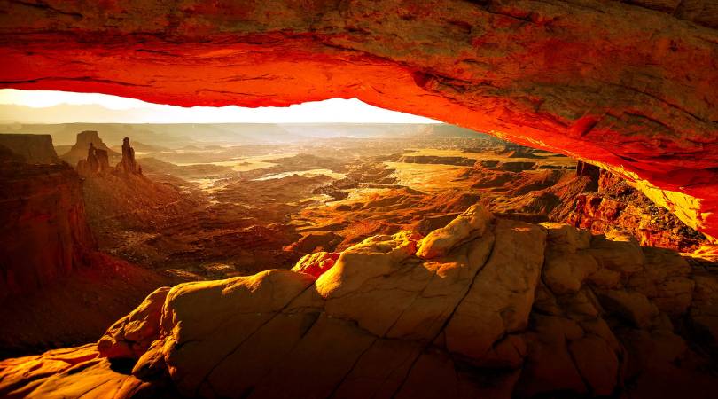 golden sunlight hitting arches national park