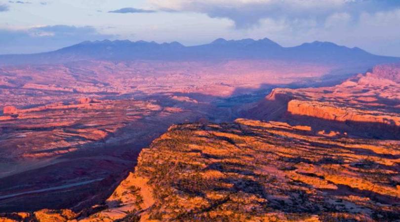 aerial view of red rocks of utah in pink light