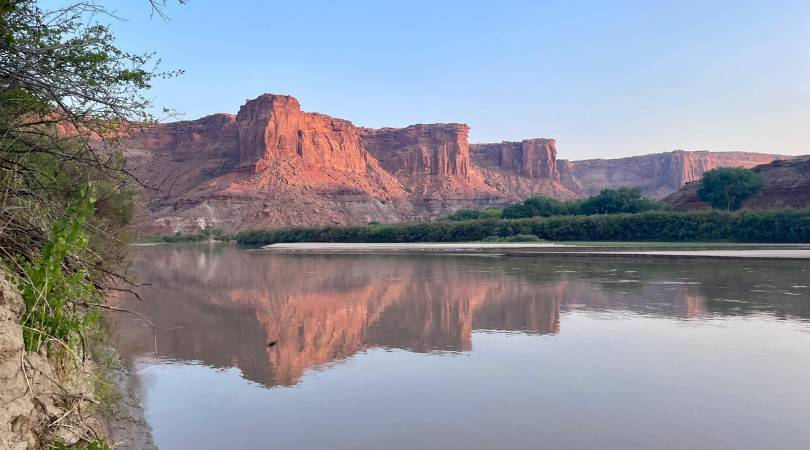 reflection of rock walls on the river