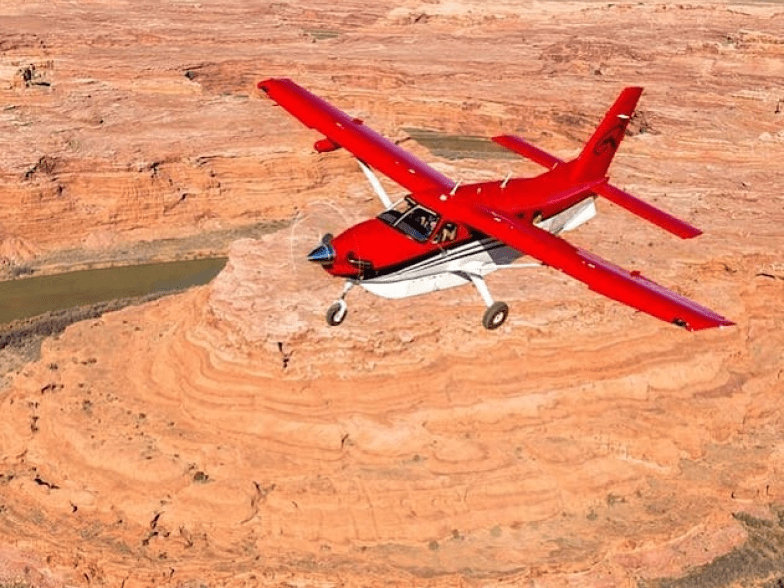 An airplane flying over Moab