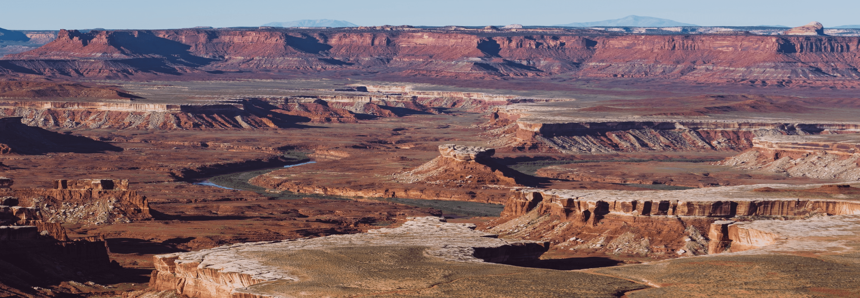 aerial view of backcountry arches and red rock cliffs on a helicopter tour