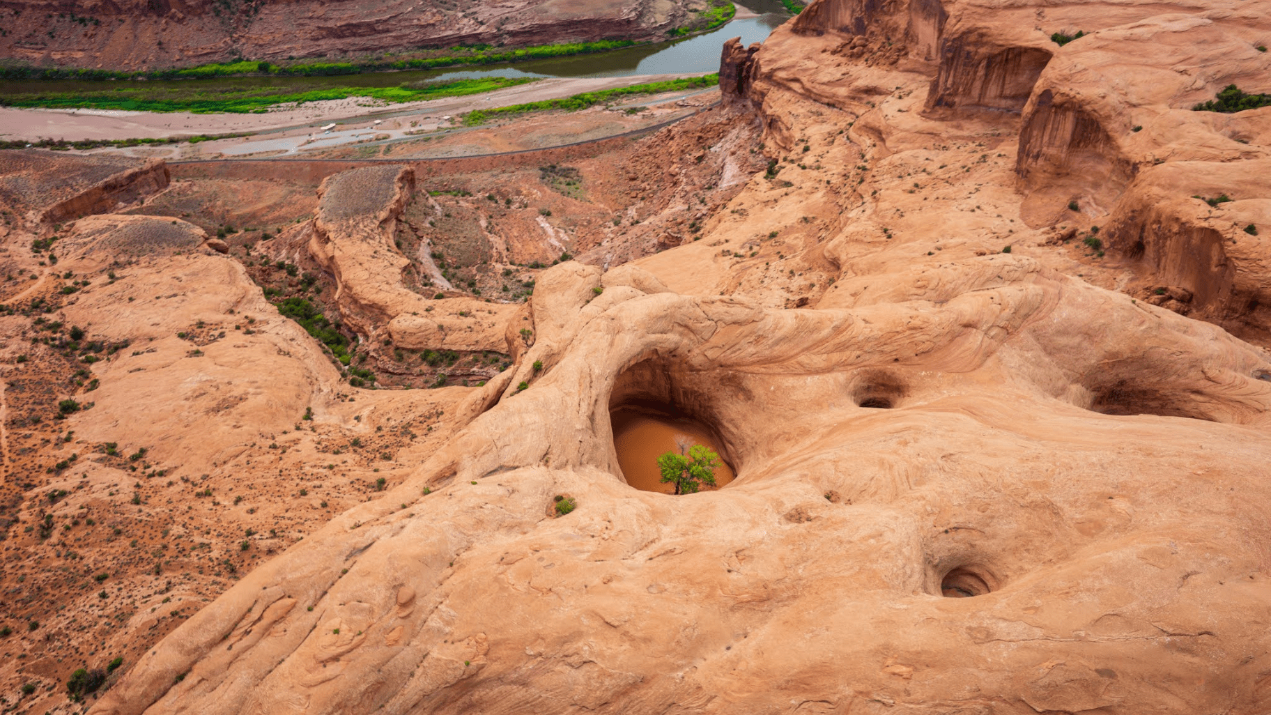 aerial view of geological hole from a helicopter tour