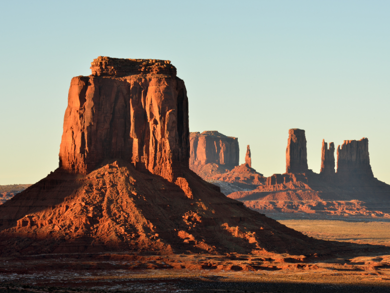 closeup of monument valley rock formations glowing from evening sun