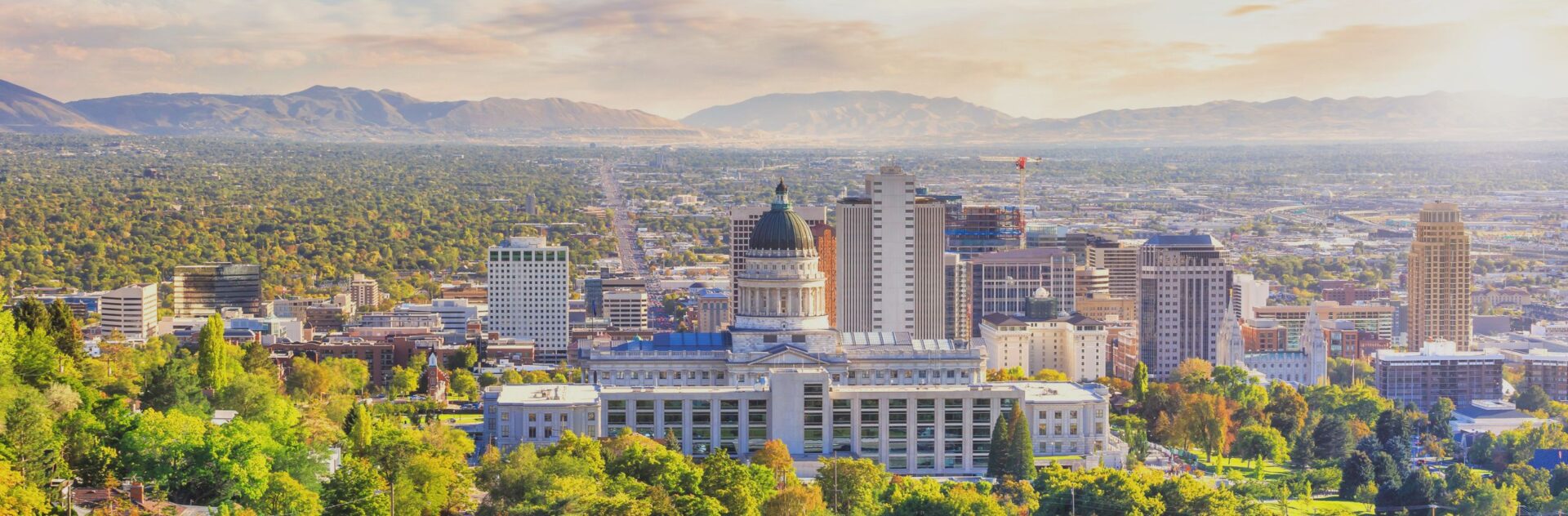 glowing sunlight shining on downtown salt lake city, utah