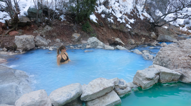 woman enjoying time in a natural hot spring at Diamond Fork Hot Springs